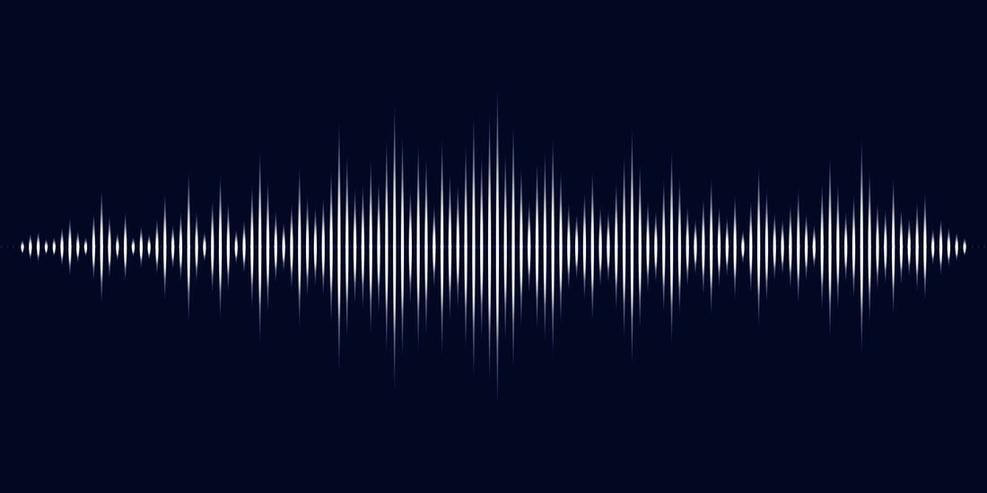 A graphic representation of a soundwave against a dark background.