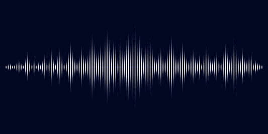 A graphic representation of a soundwave against a dark background.